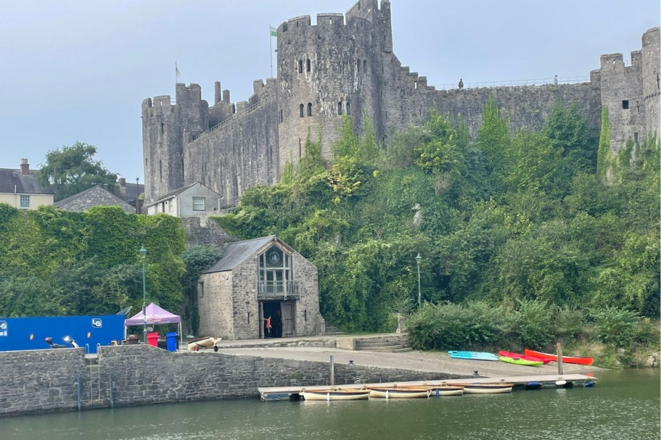 Paddle West's clubhouse sitting on the lake beneath the castle.